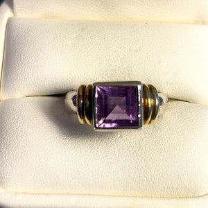 Sterling Silver Ring. Purple Center Stone. Gold detail.